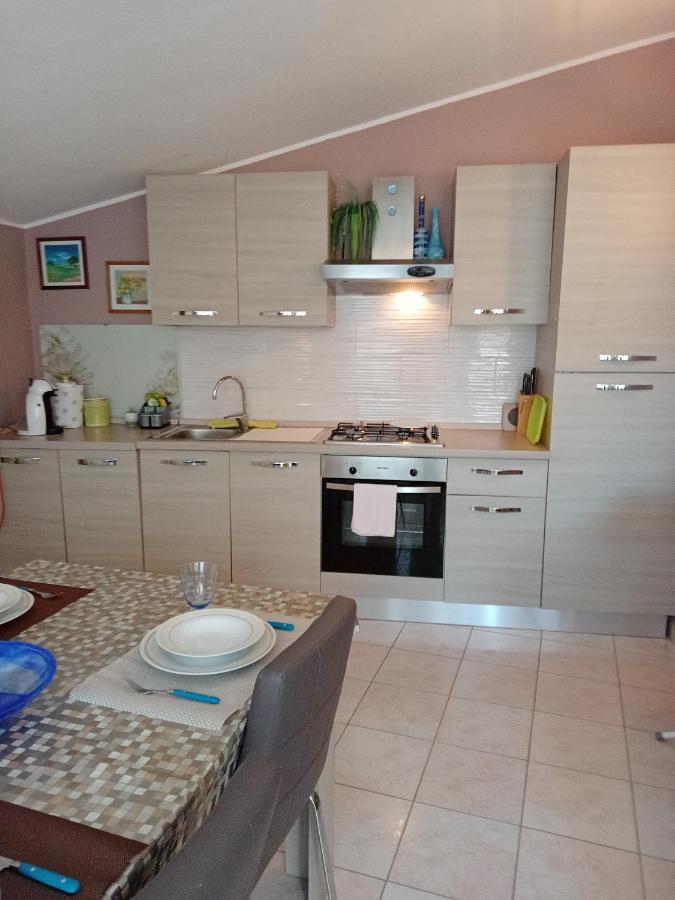 Casa Vacanza Le 2 Isole Suni Екстериор снимка